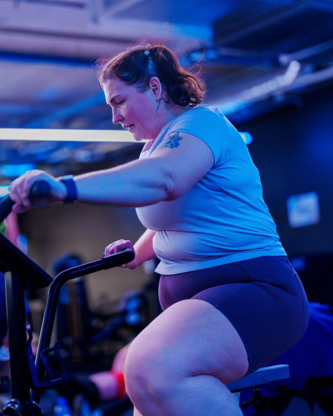 Sweatshed Training — member on the bike